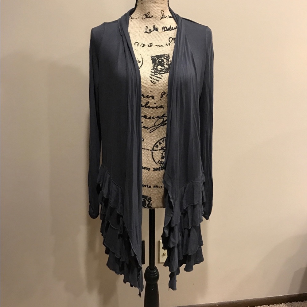 Beautiful gray jacket with ruffles